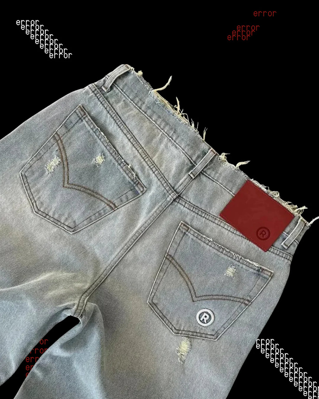 'DISTRESSED' BAGGY JEANS